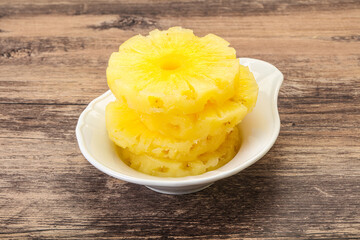 Sweet pineapple rings in the bowl