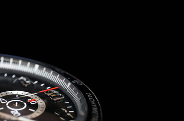 Dial Luxury quartz watch chronograph on black background, copy space