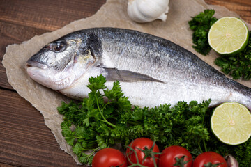 Sea bream and ingredients for cooking