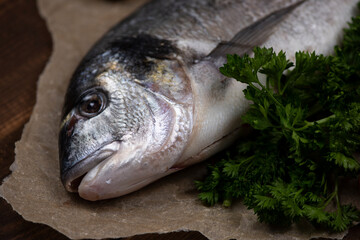 Sea bream and ingredients for cooking