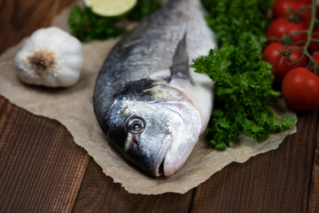 Sea bream and ingredients for cooking
