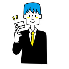 カードを手に持っているスーツの男性