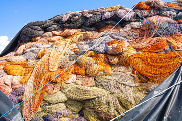 Fototapeta premium Fishing nets stack or heap in the fishing harbor.