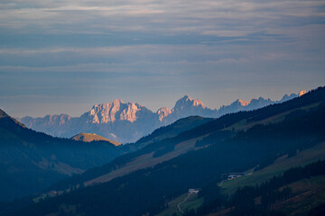 view to the Wilder Kaiser in tirol austria at the sunrise on summer morning