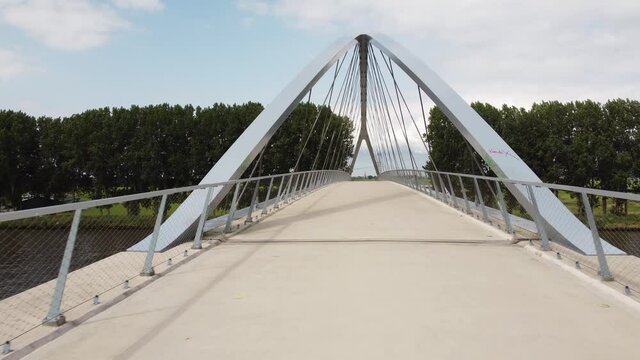 Pedestrian and cyclist bridge over the Amsterdams Rijn Canal,  waterway in Nigtevecht The Netherlands. Liniebrug