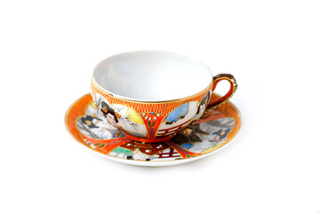 Antique Japanese Porcelain Tea Pair Cup And Saucer In The Style Of Moriage Isolated On White Background. Meiji Period.