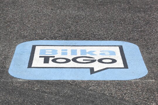 Horsens, Denmark - May 13, 2021: BilkaToGo logo on the bitume. BilkaToGo is Denmark's largest online food range. Bilka is a Danish chain of hypermarkets and it is now a part of Dansk Supermarked