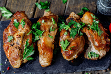 Lamb Meat On Black Board With Spices And Tomatoes On Wooden Background.