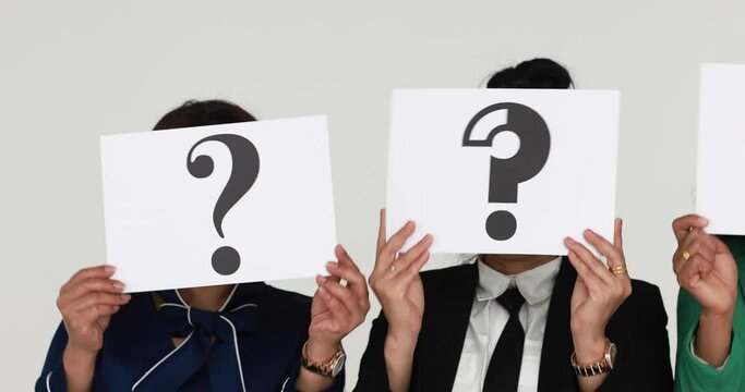 Group in row of businesspeople in business clothes hold paper with question mark signs in symbol of asking and need for answers. Concept of losing patience and show problems in working or job.