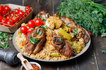 Traditional Pilaf With Lamb, Vegetables, Spices On Wooden Table Background. Side View.
