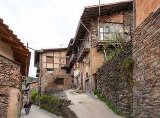 View of a peculiar streets example of the typical architecture of the town of Robledillo de Gata.
