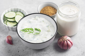 Traditional Indian Raita with Dahi in a bowl with dill