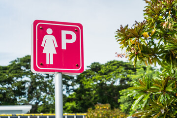 Pink signpost of parking lot for female