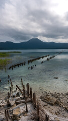 Fototapeta na wymiar Lake, mountain and broken jetty, Japan
