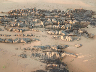Fototapeta na wymiar Sunset drone view of amazing rock formations and sandstones in Desert, Chad, Africa