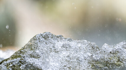 Running river water looks frozen with negative space  