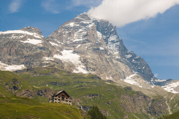 Fototapeta na wymiar View of Breuil-Cervinia, the town of the Aosta Valley at the foot of the Matterhorn in the summer season