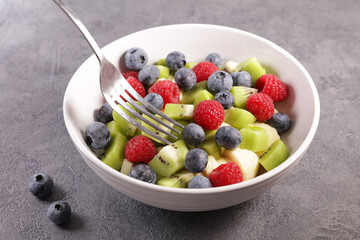 berry fruit salad with banana and kiwi