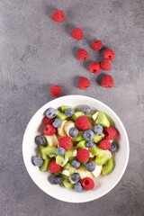 berry fruit salad with banana and kiwi
