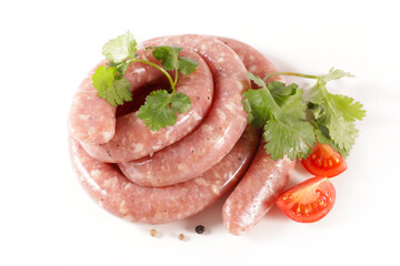 raw sausage and herbs isolated on white background