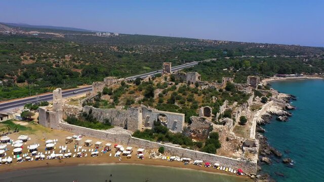 Kızkalesi is a town in Mersin Province, Turkey. The town, known in Antiquity as Corycus or Korykos, is named after the ancient castle built on a small island just facing the town.