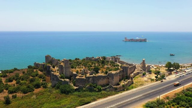Kızkalesi is a town in Mersin Province, Turkey. The town, known in Antiquity as Corycus or Korykos, is named after the ancient castle built on a small island just facing the town.