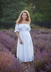 Fototapeta na wymiar Portrait of a beautiful girl in lavender.