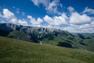Fototapeta na wymiar High altitude mountain landscape under blue sky