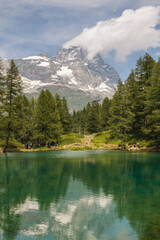 Wonderful view of blue lake (Lago blu) with matterhorn massif in the background, Valle d'Aosta, Italy