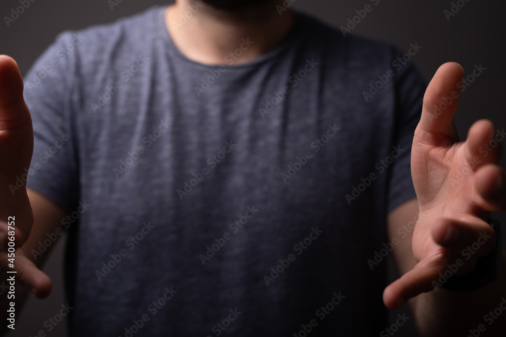 Poster man showing his empty hand.