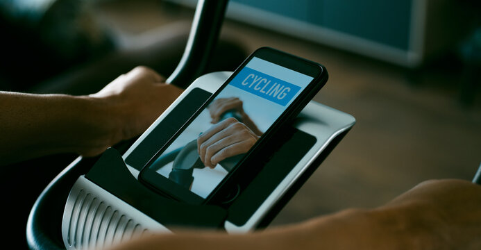 man using an exercycle, web banner