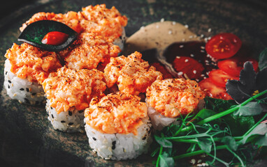 sushi roll in plate on wooden table background