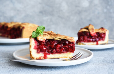 slice of cherry pie on the kitchen table. Fruit pie. Tart.
