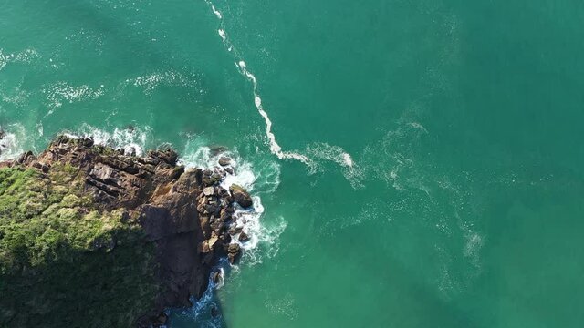 Aerial view of calm waves at the corner of bat at brava beach, Itaja&iacute;, Brazil