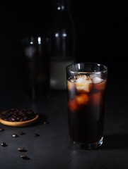 Cold coffee with ice in low key