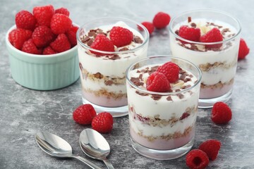 Granola with yogurt trifles with raspberry