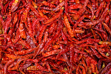 Dried red chili goat peppers background