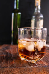 liquor glass on wooden table