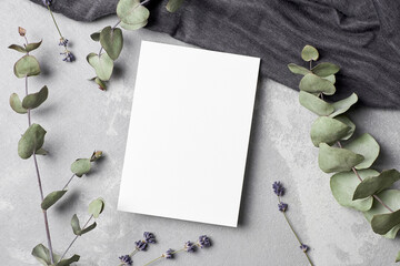 Greeting or invitation card mockup with textile, dry lavender flowers and eucalyptus twigs