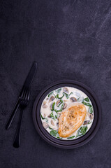 Fried bird breasts with stewed vegetables