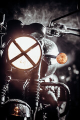 Naklejka na ściany i meble Silhouette of black retro styled motorcycle scrambler at night in fog. Adventure, motor vehicle, custom motorbike concept. Dark night with haze