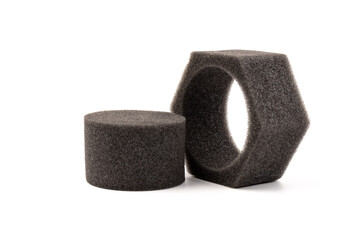 piece of foam rubber on white background. Black sponge