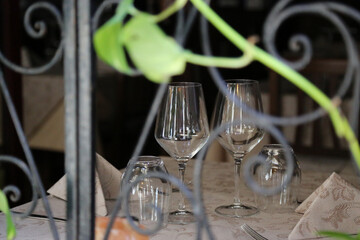 Empty glasses on the Restaurant table waiting for guests