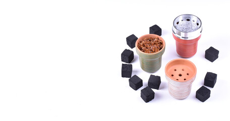 Hookah bowls with tobacco and charcoal for smoking on a white background. Space for text. Banner