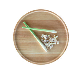 Fresh lemongrass and chilli on a wooden tray
