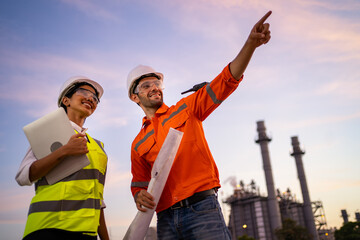 Engineer inspecting in industrial oil refinery. Industry 4.0 concept. Background blurred concept.