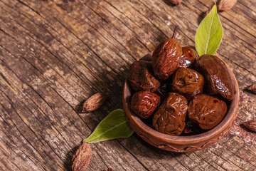 Sun-dried olives in a ceramic bowl
