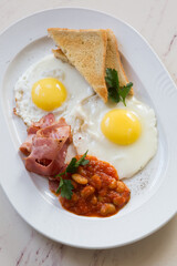 Plate of english breakfast set ready for breakfast