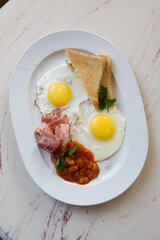 Plate of english breakfast set ready for breakfast