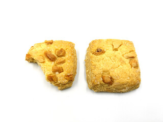 Home made sweet biscuits with mixed nuts on white background